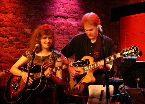 SGA President Rick Carnes along with Janis Carnes perform at an open mic night at SGA Week.